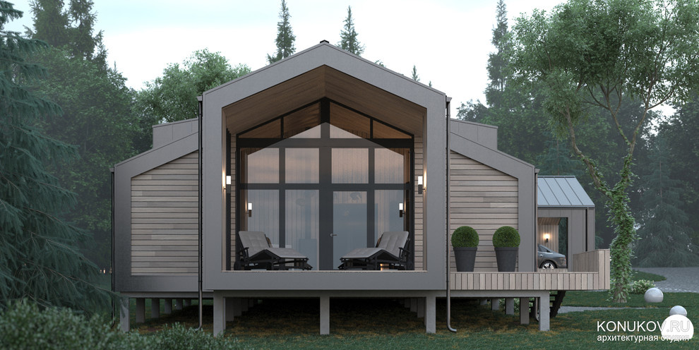 Модульный каркасный дом в современном стиле с гаражом /Архитектор konukov.ru/