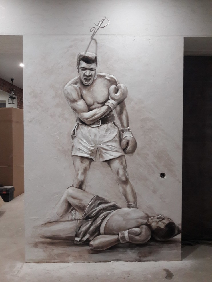 Обложка проекта: Барельеф Мухамеда Али в зале для бокса.