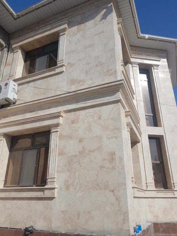 облицовка фасадов травертином из Ирана