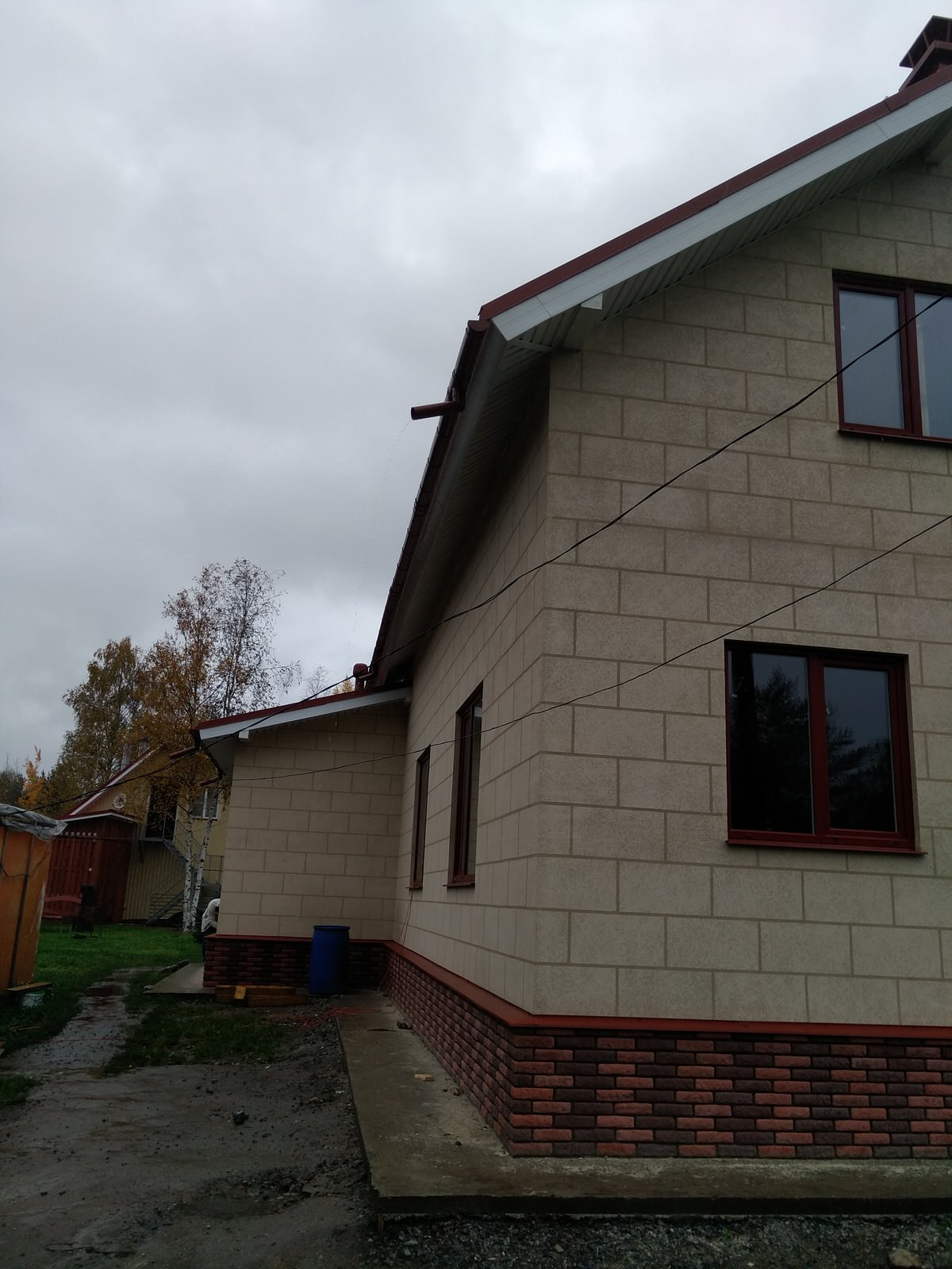 Изготовление фасада из декоративной штукатурки в Кириши