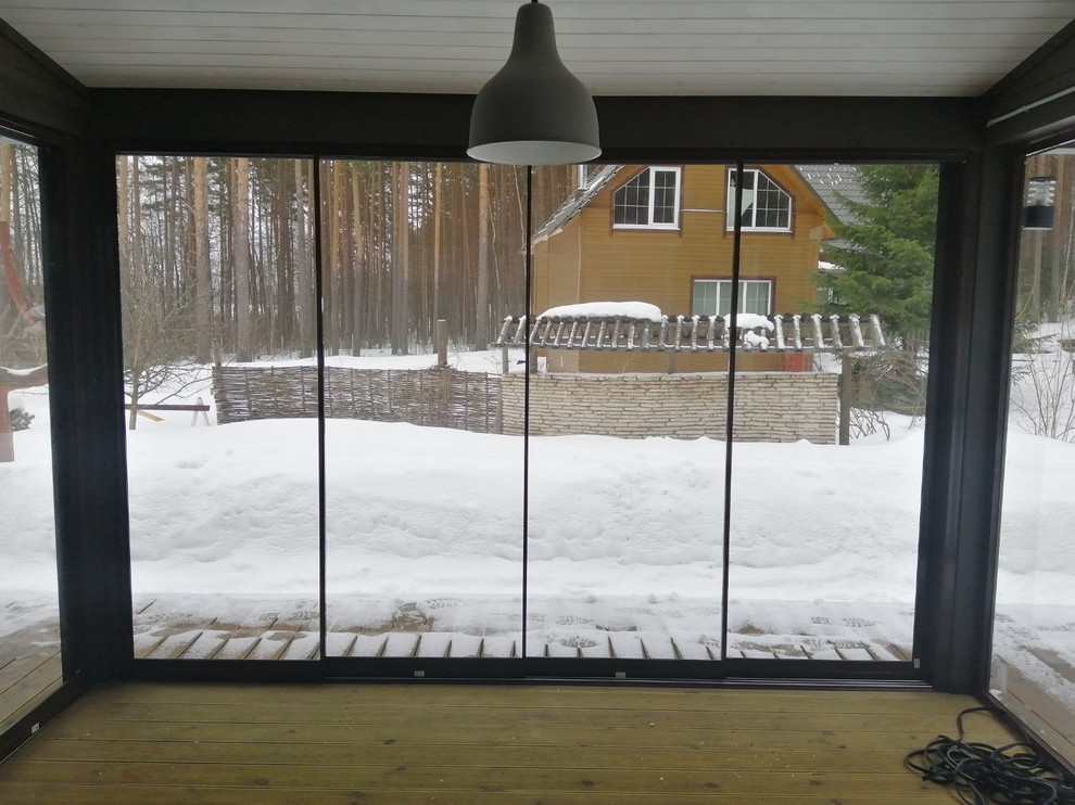 Панорамное остекление террасы - слайдерная система (Лосево)