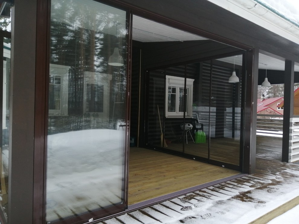 Панорамное остекление террасы - слайдерная система (Лосево)