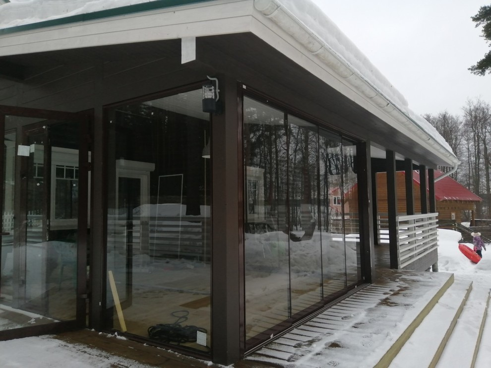 Панорамное остекление террасы - слайдерная система (Лосево)