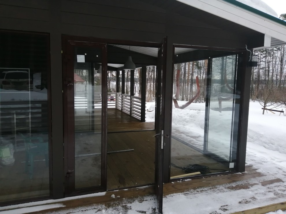 Панорамное остекление террасы - слайдерная система (Лосево)