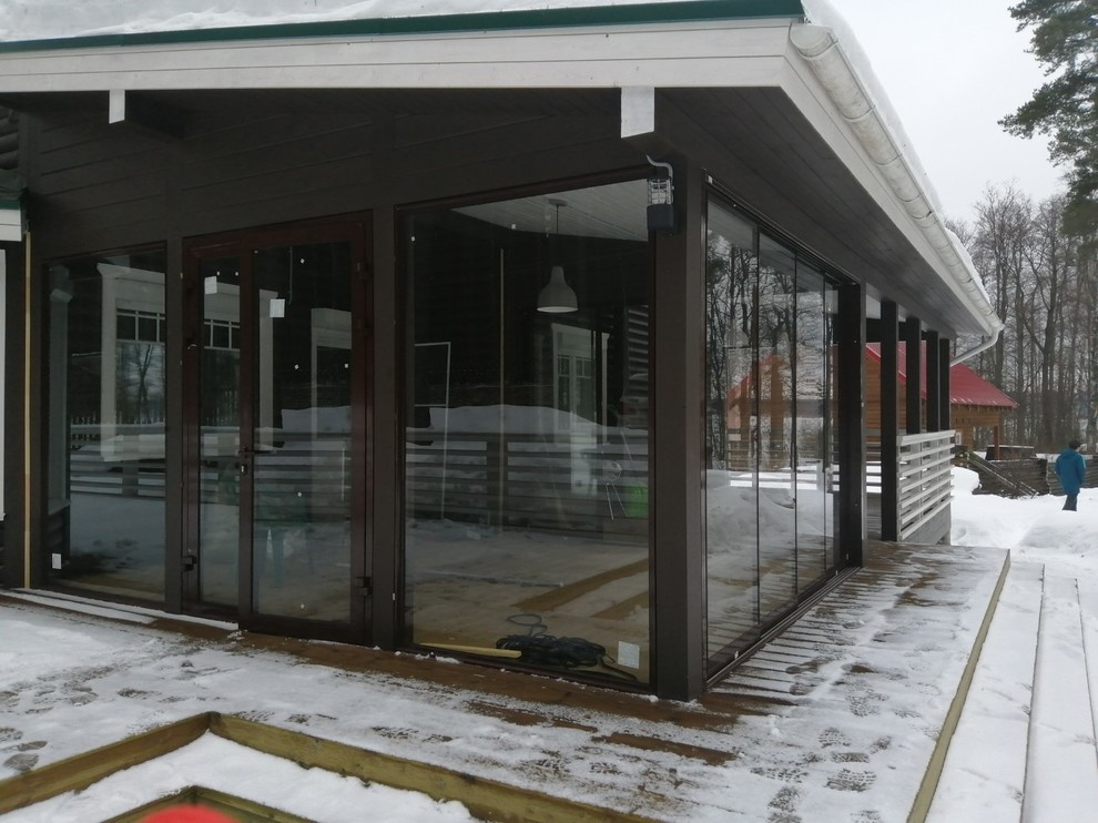 Панорамное остекление террасы - слайдерная система (Лосево)