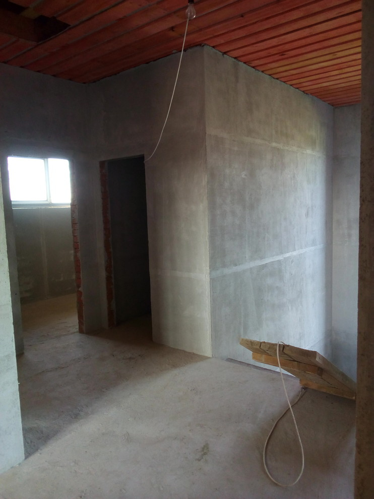 Штукатурка стен по горизонтальным,гипсовым маякам в Коттедже