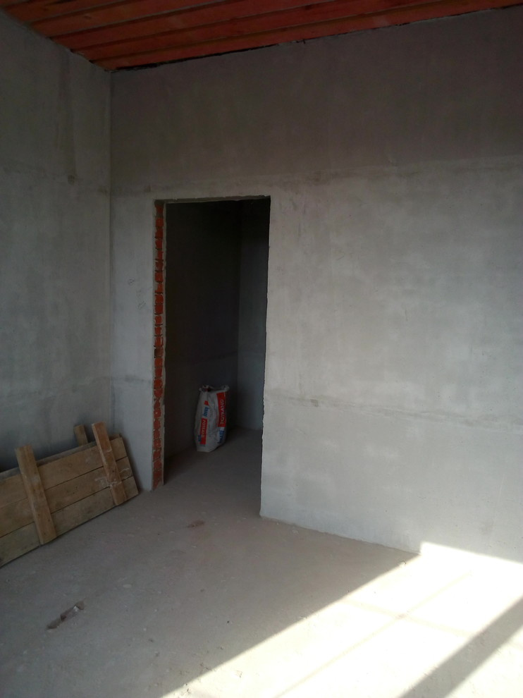 Штукатурка стен по горизонтальным,гипсовым маякам в Коттедже