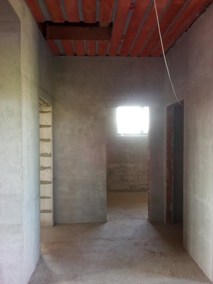 Штукатурка стен по горизонтальным,гипсовым маякам в Коттедже