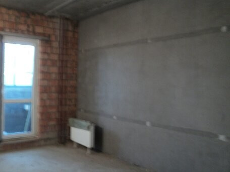 Штукатурка стен по горизонтальным,гипсовым маякам ЖК Отрада