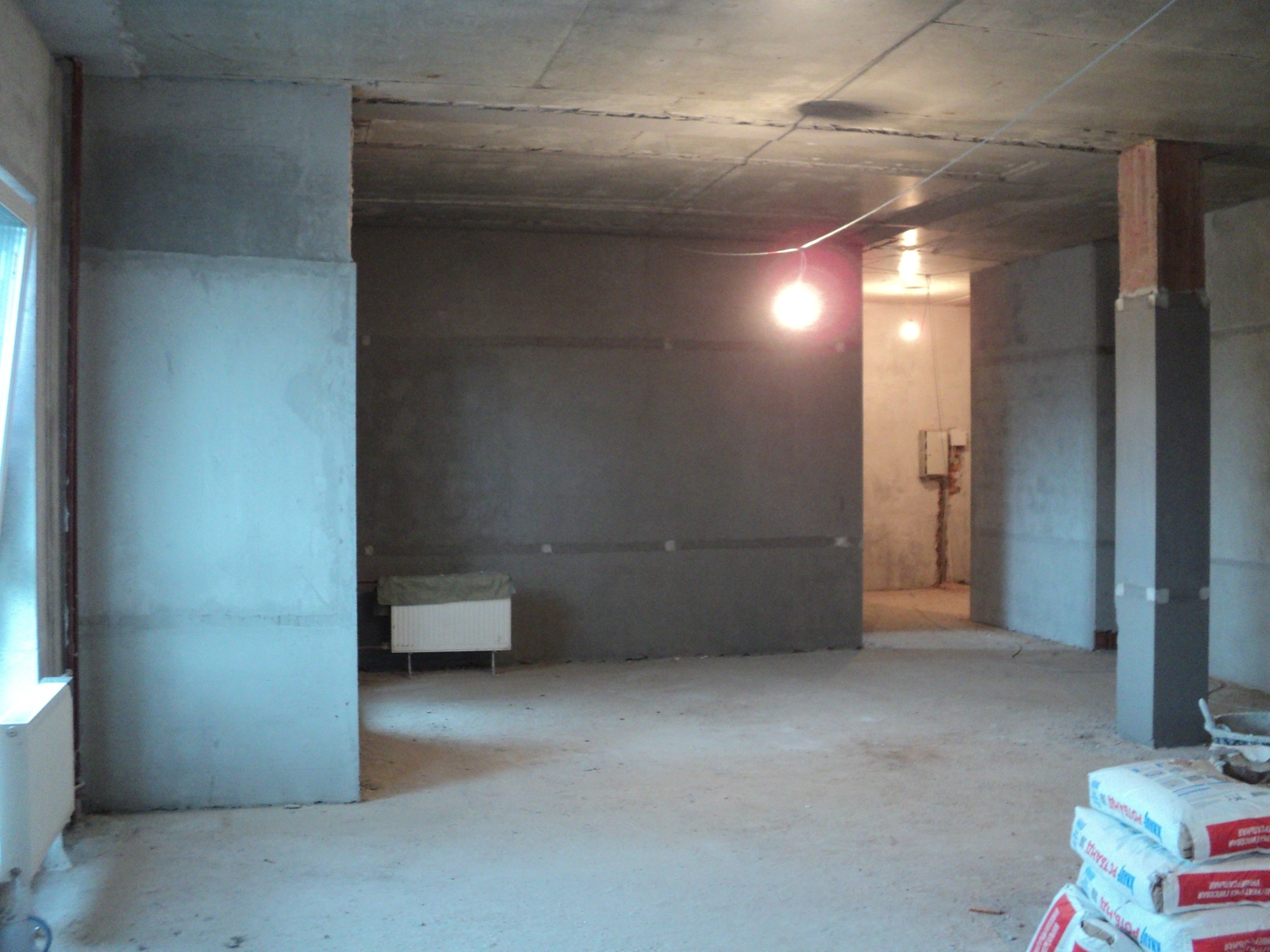 Штукатурка стен по горизонтальным,гипсовым маякам ЖК Отрада