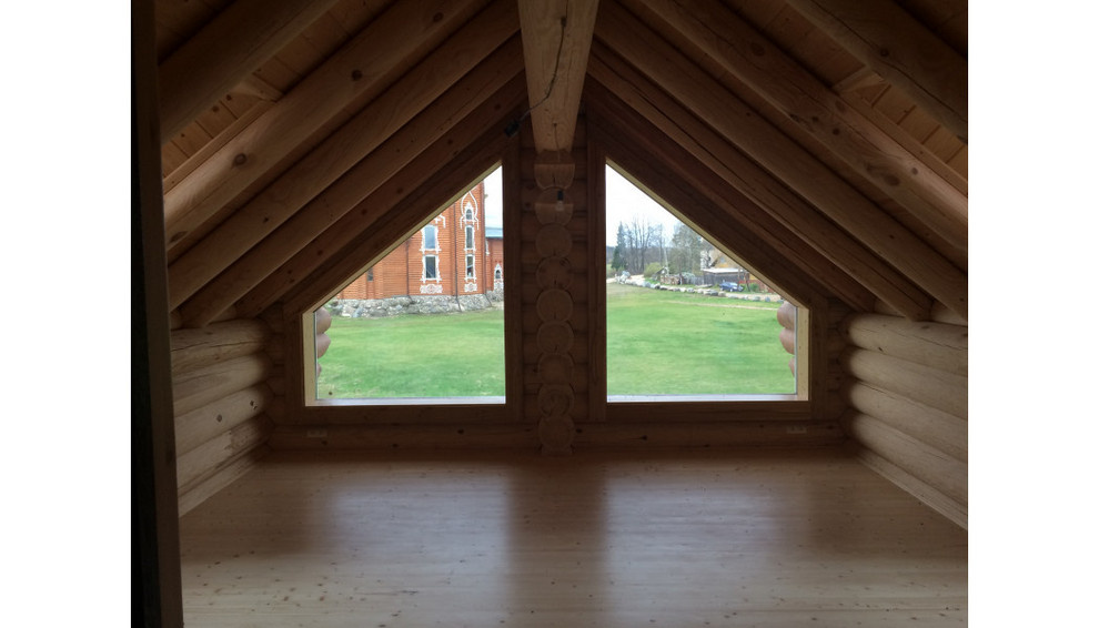 Дом в стиле шале из оцилиндрованного бревна 280 мм