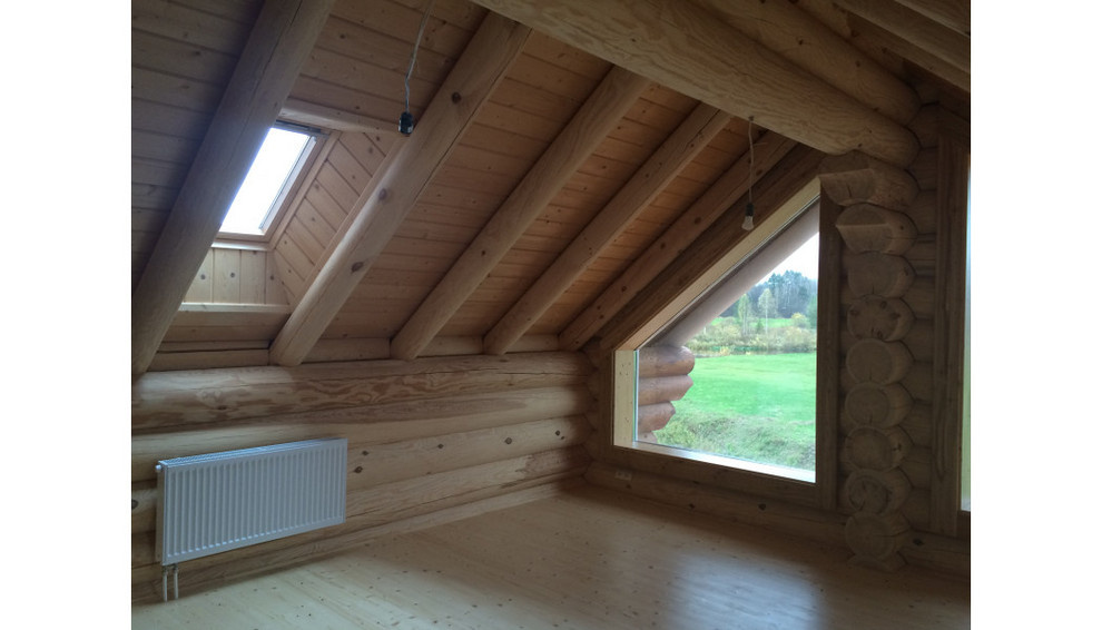 Дом в стиле шале из оцилиндрованного бревна 280 мм