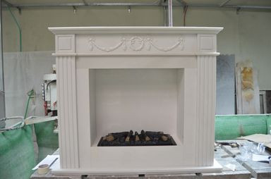 Обложка проекта: Мраморный портал для электрокамина в квартире