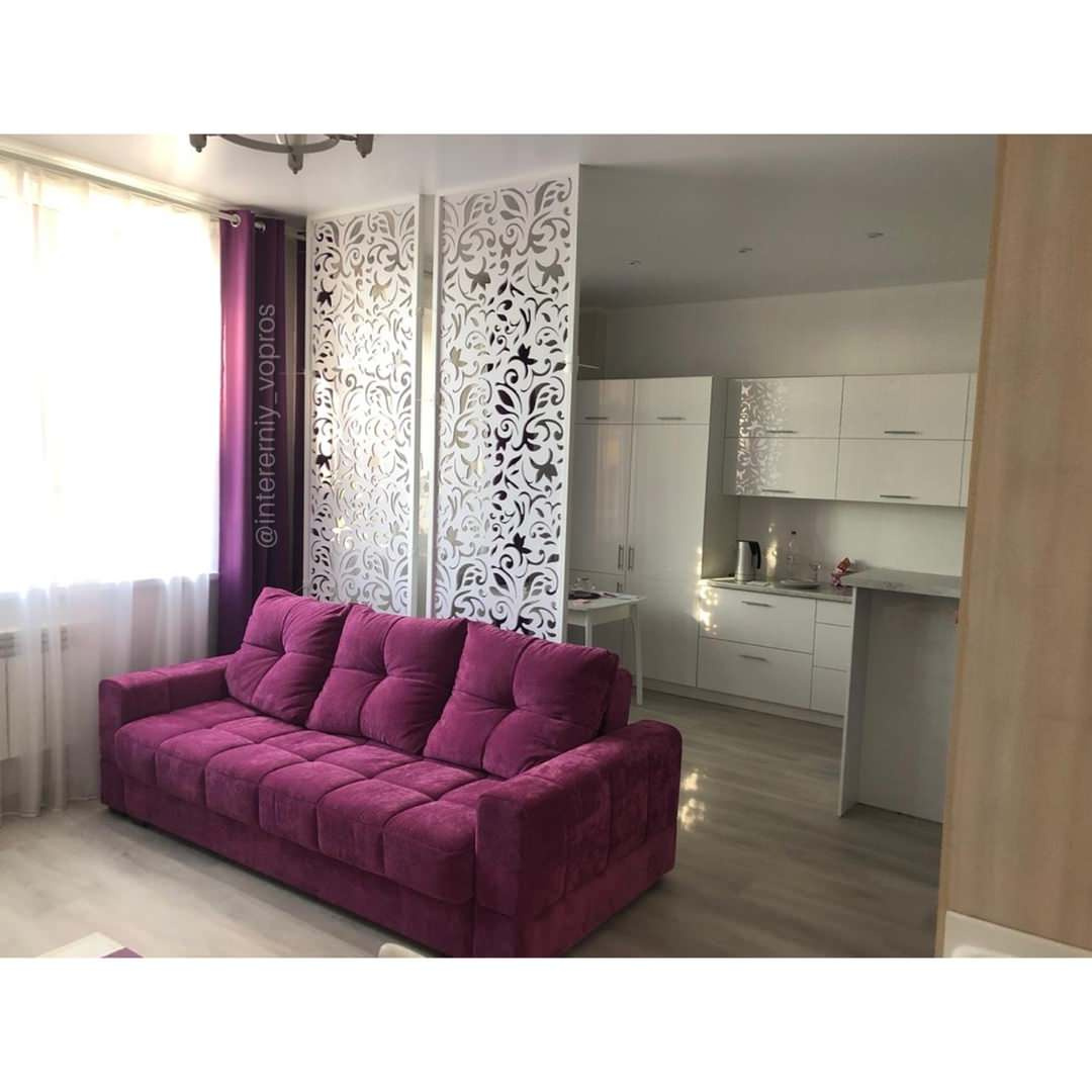 Зонирование резными перегородками