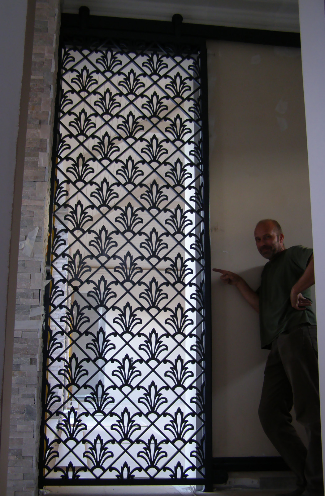 Откатная защитно-декоративная дверь.