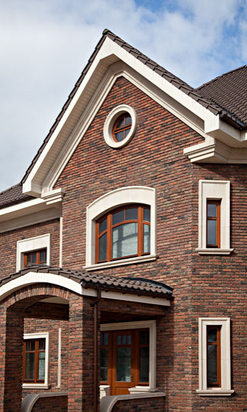 Сочетание искусственного камня и облицовочного кирпича