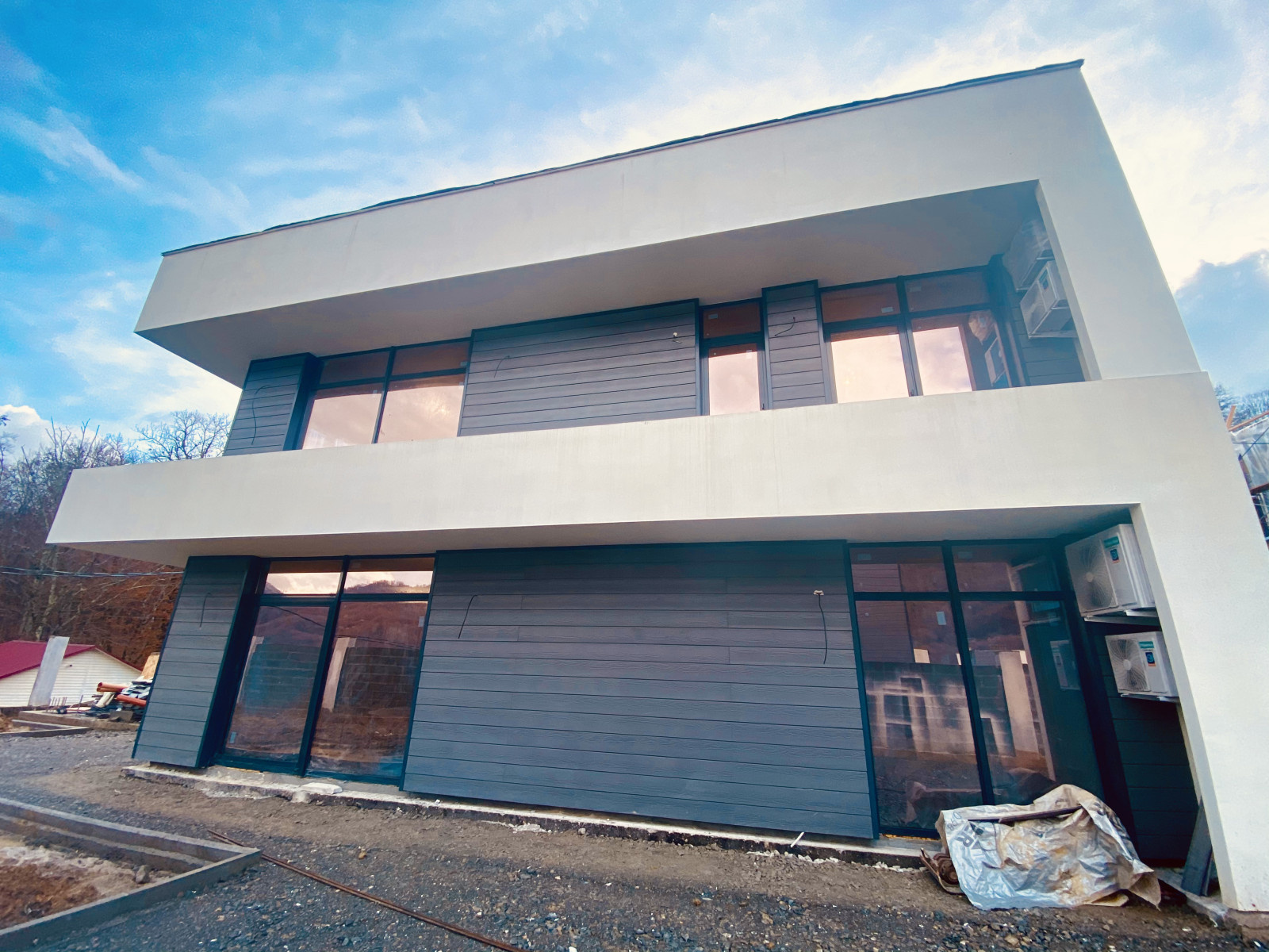 Отделка фасадов коттеджного поселка