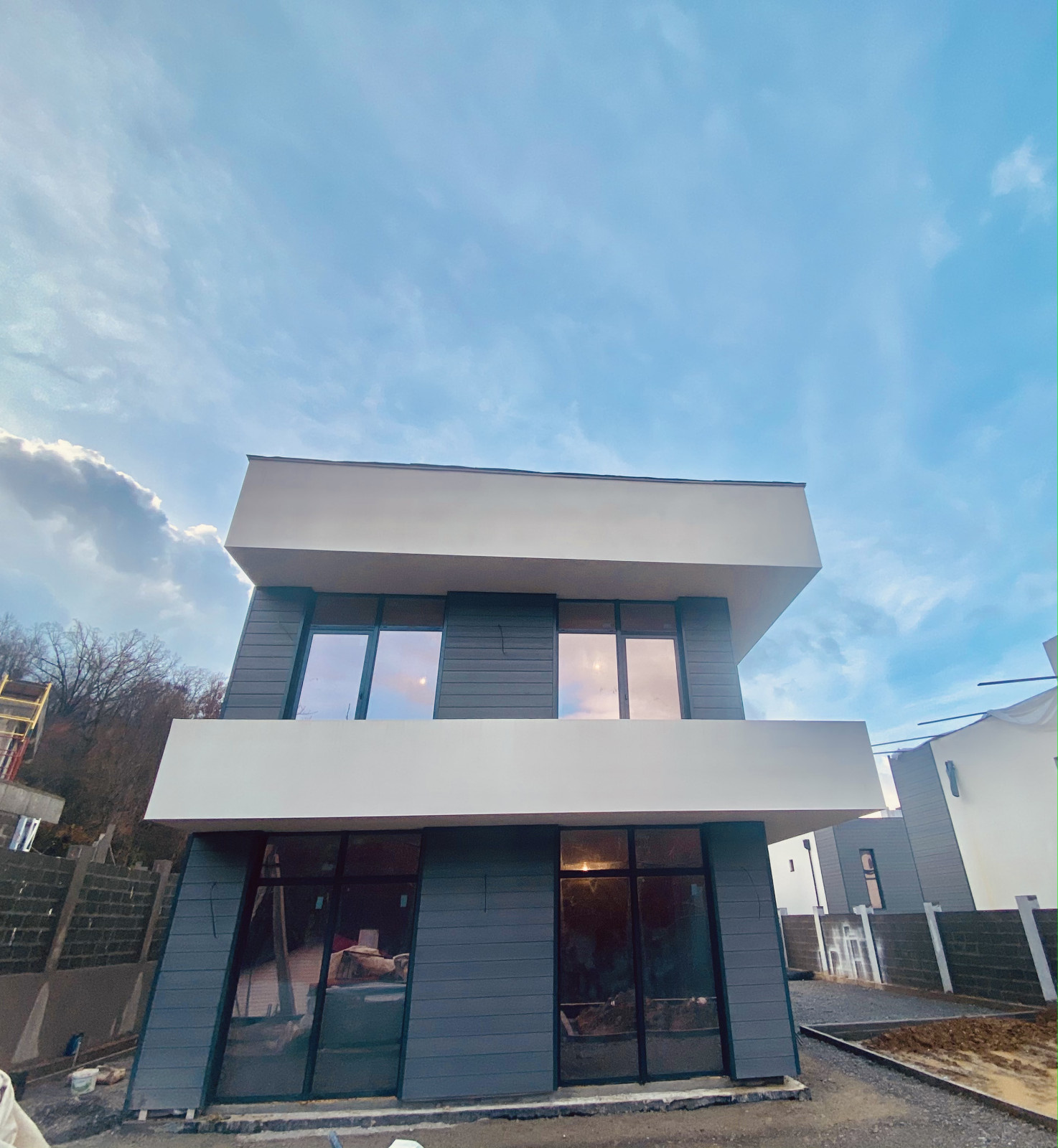 Отделка фасадов коттеджного поселка