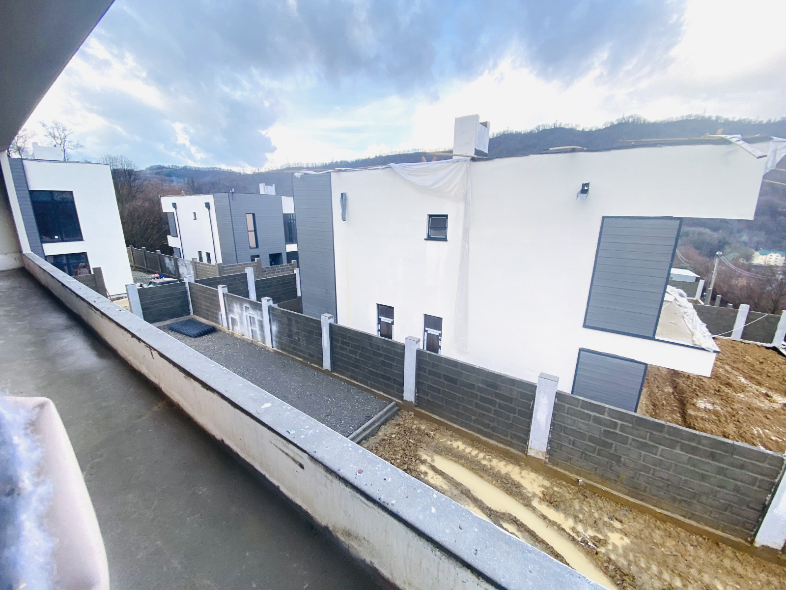 Отделка фасадов коттеджного поселка