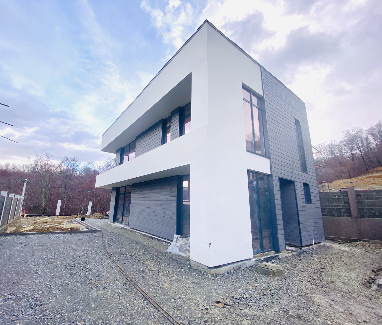 Отделка фасадов коттеджного поселка