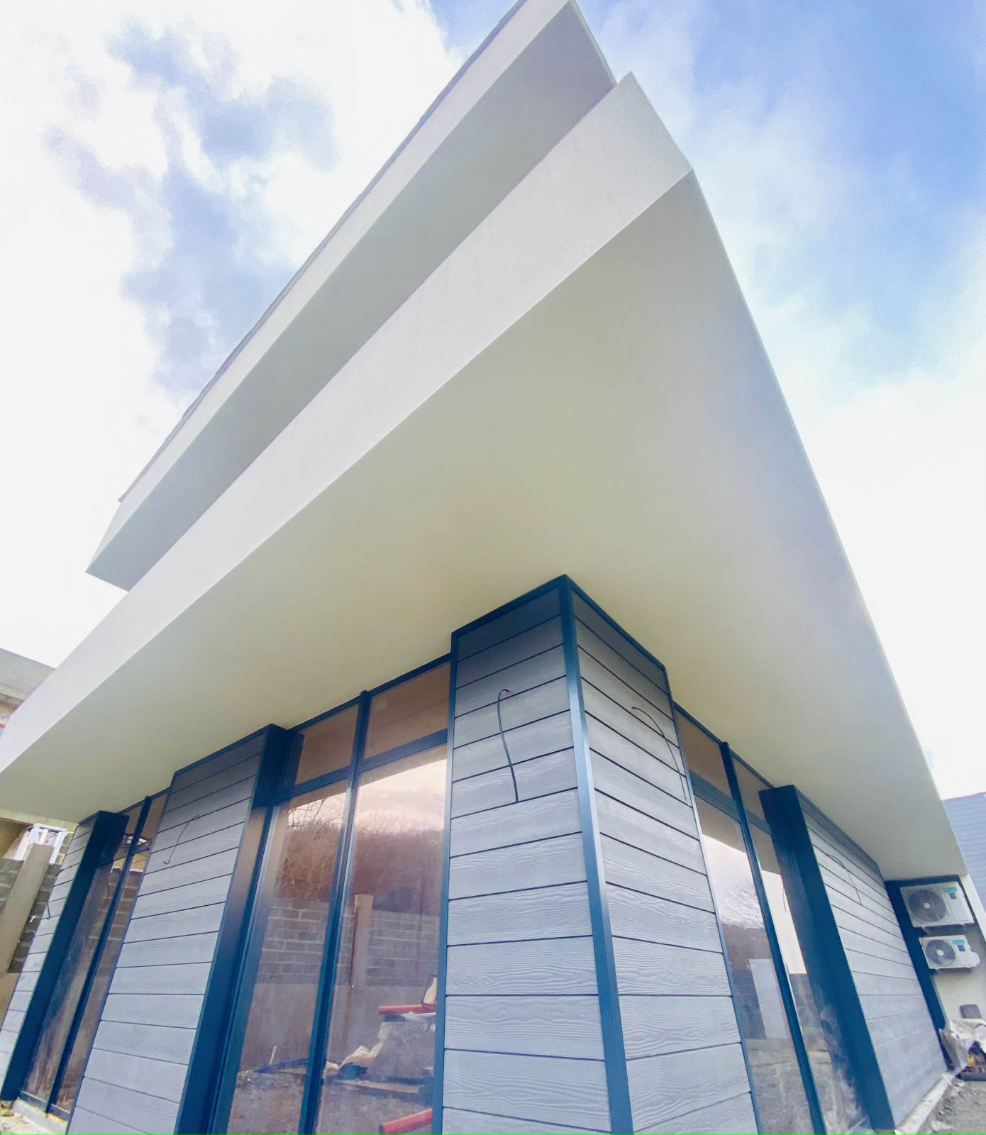 Отделка фасадов коттеджного поселка