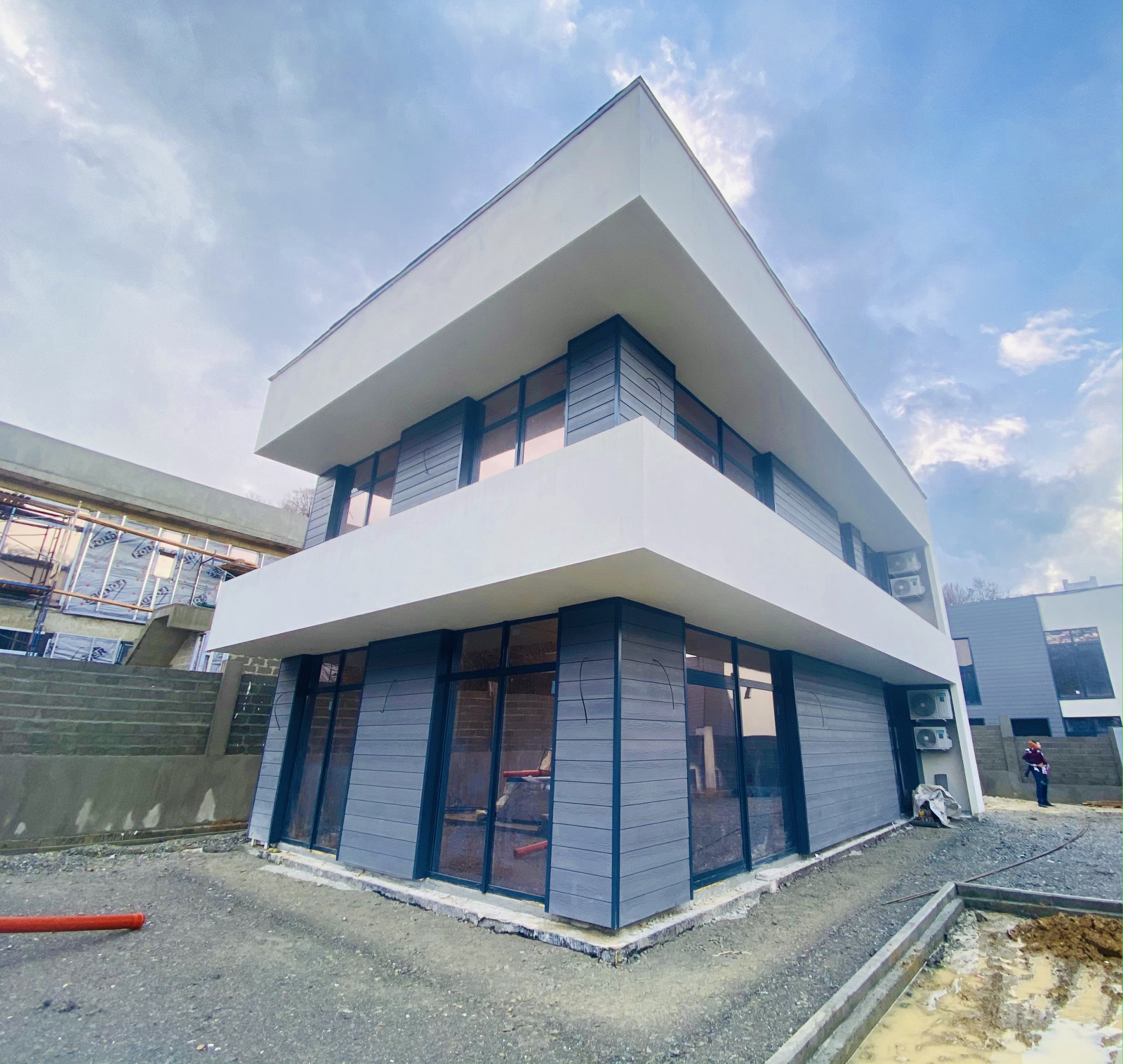 Отделка фасадов коттеджного поселка