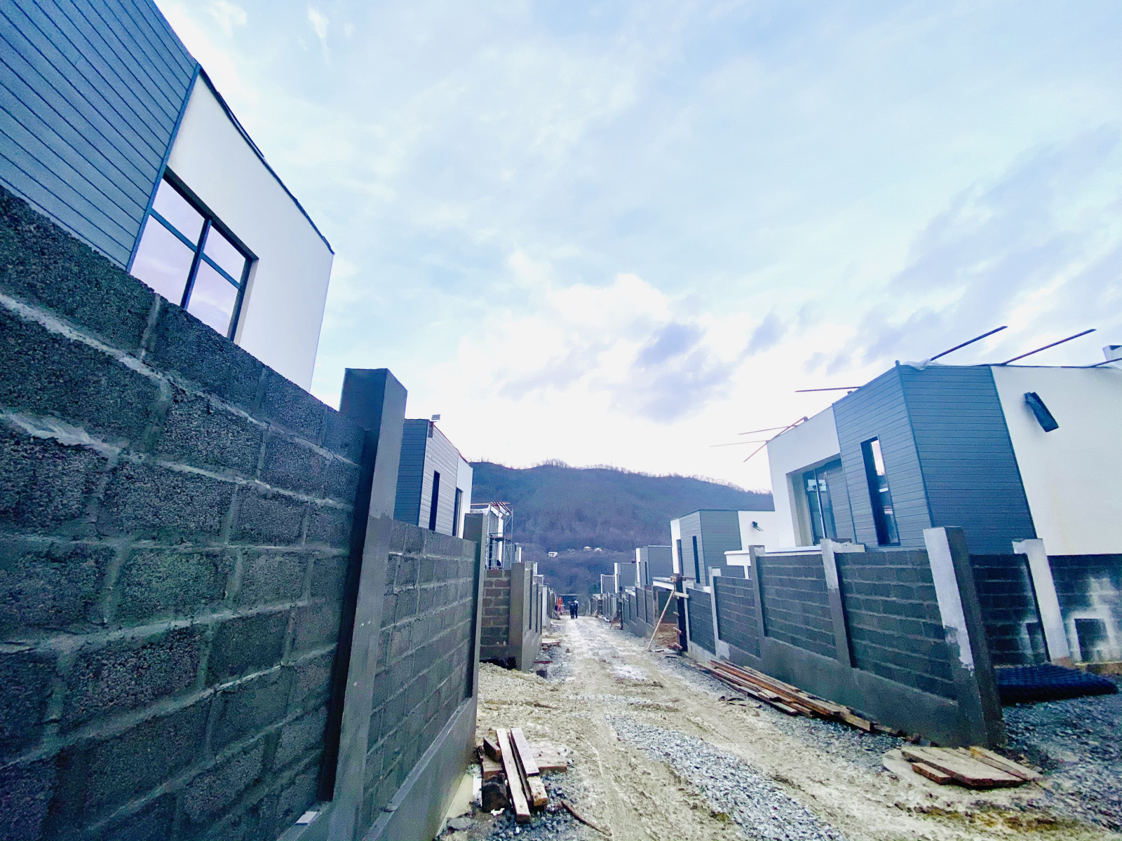 Отделка фасадов коттеджного поселка