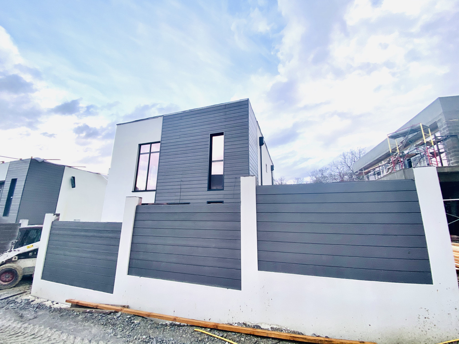 Отделка фасадов коттеджного поселка