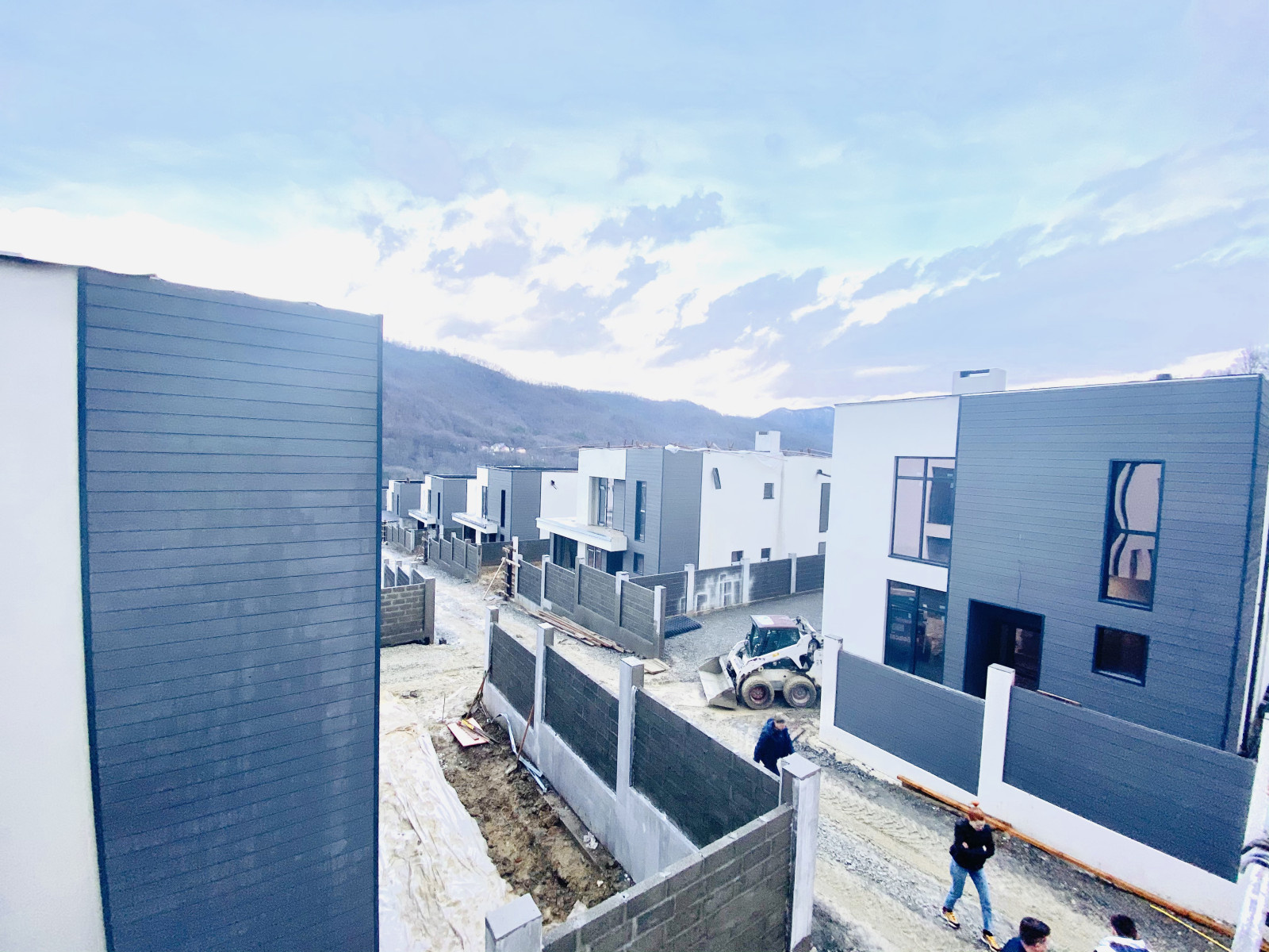 Отделка фасадов коттеджного поселка