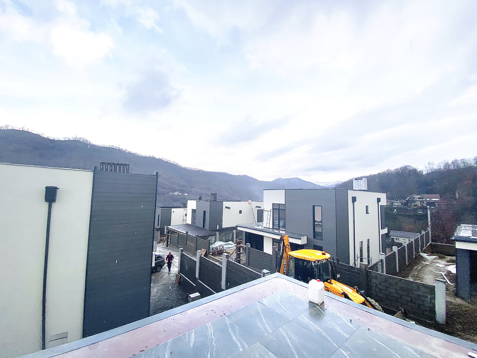 Отделка фасадов коттеджного поселка