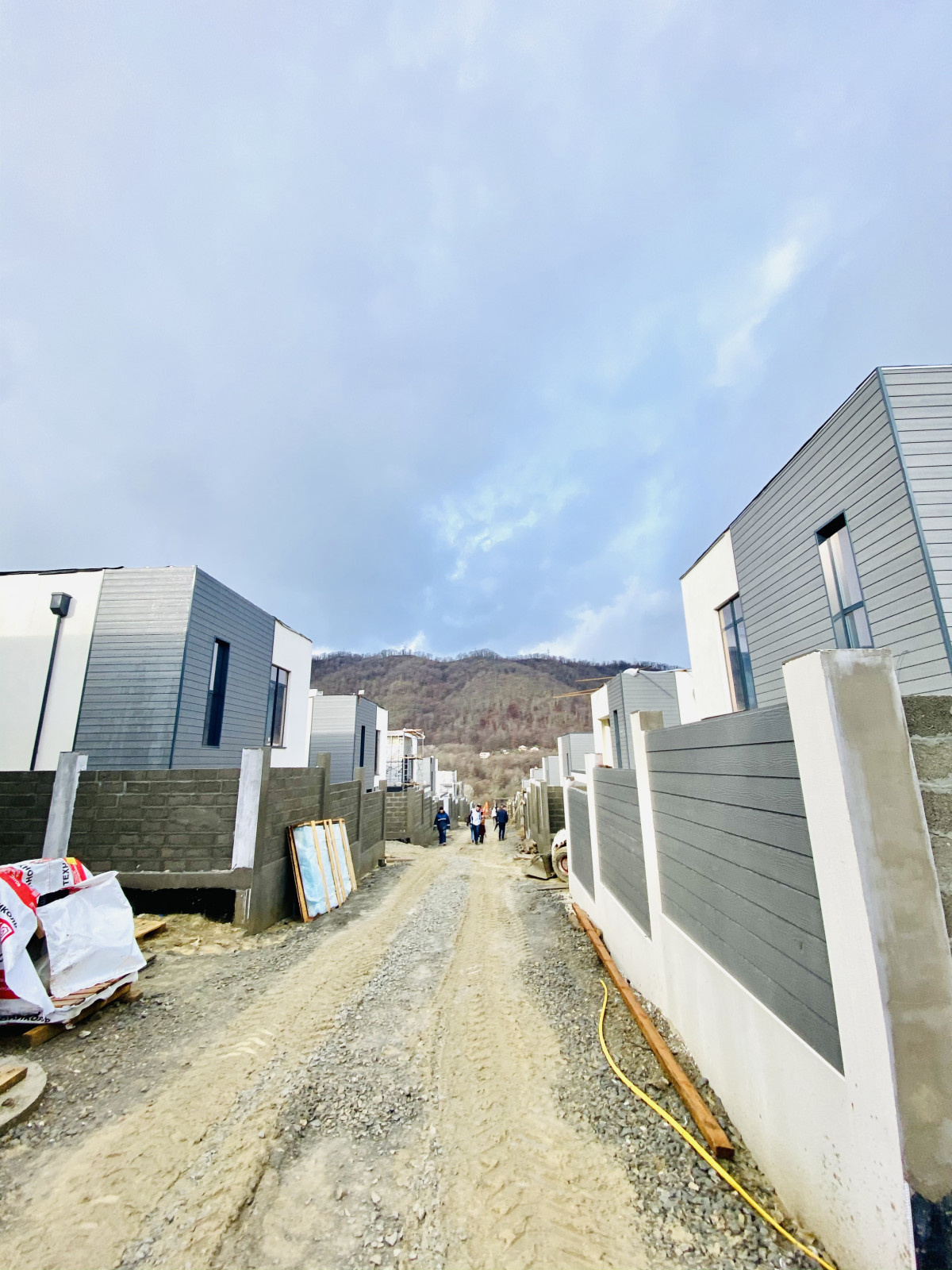 Отделка фасадов коттеджного поселка