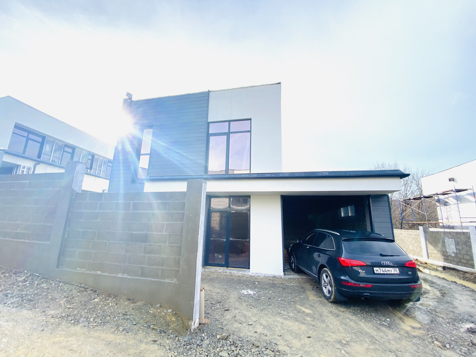 Отделка фасадов коттеджного поселка