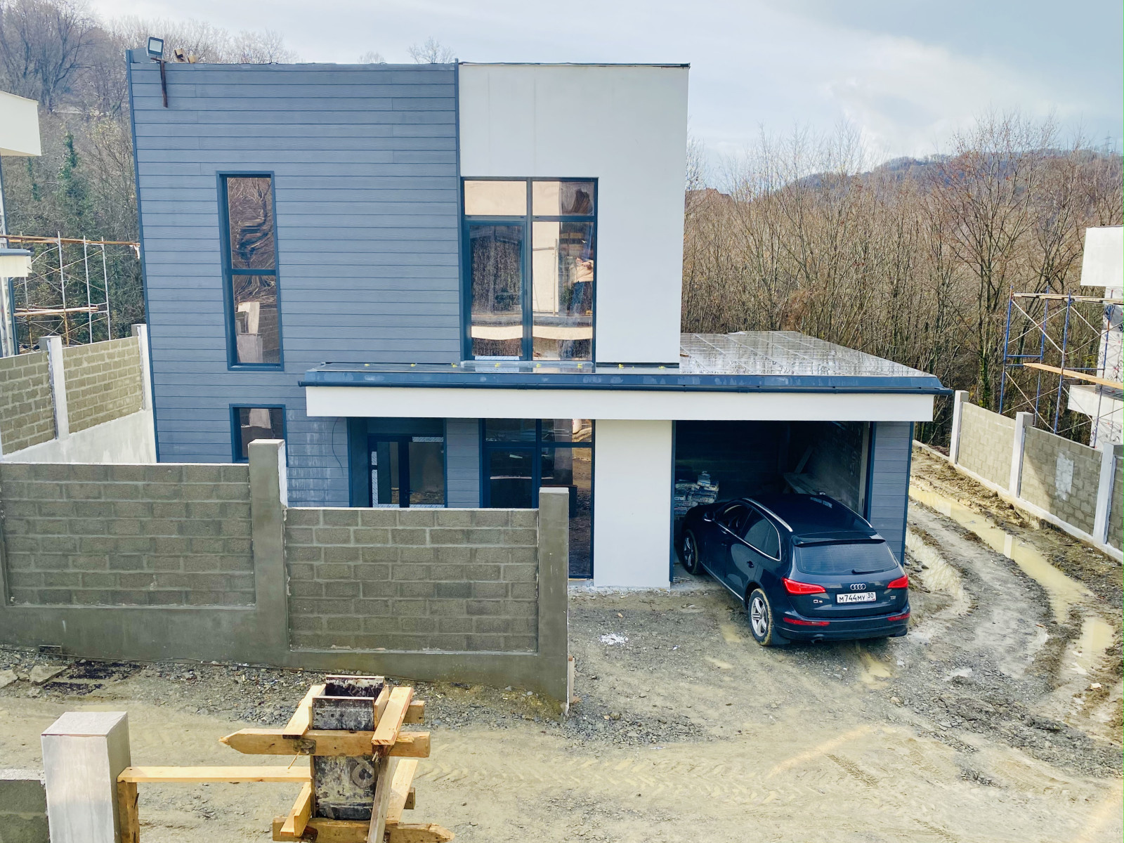 Отделка фасадов коттеджного поселка