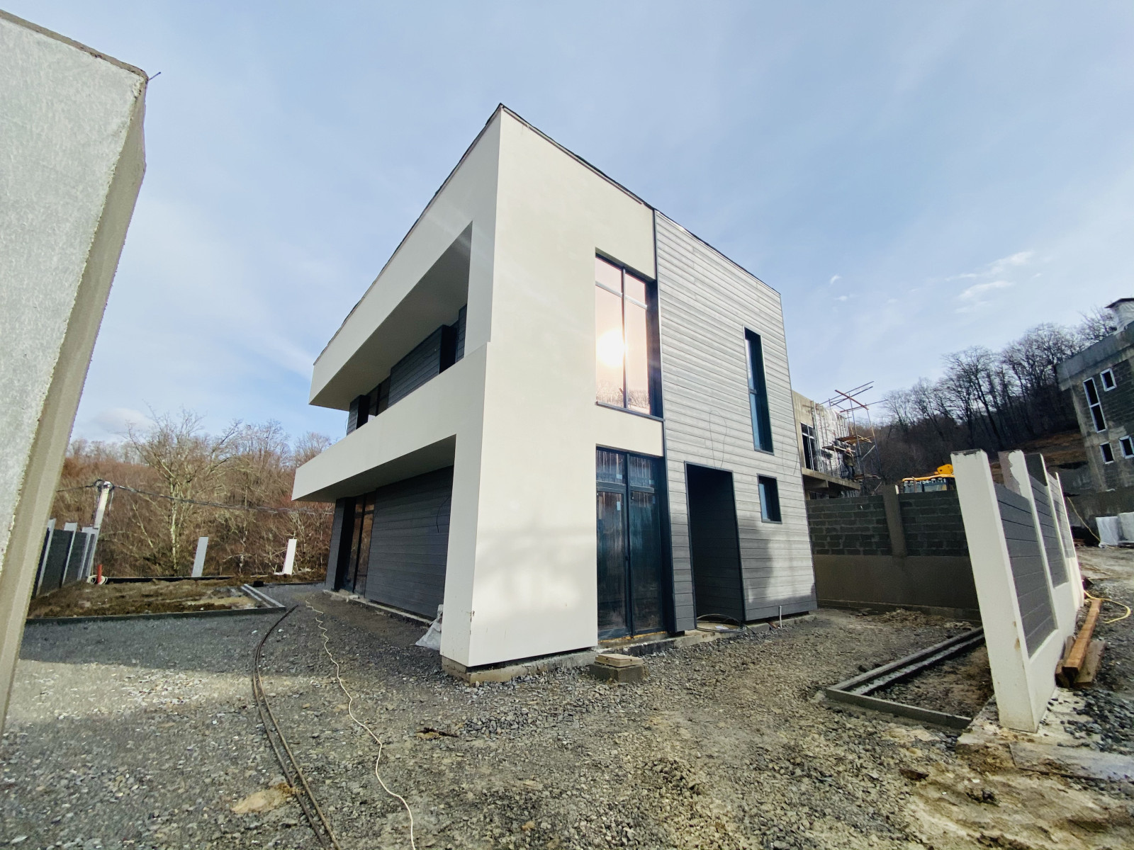 Отделка фасадов коттеджного поселка