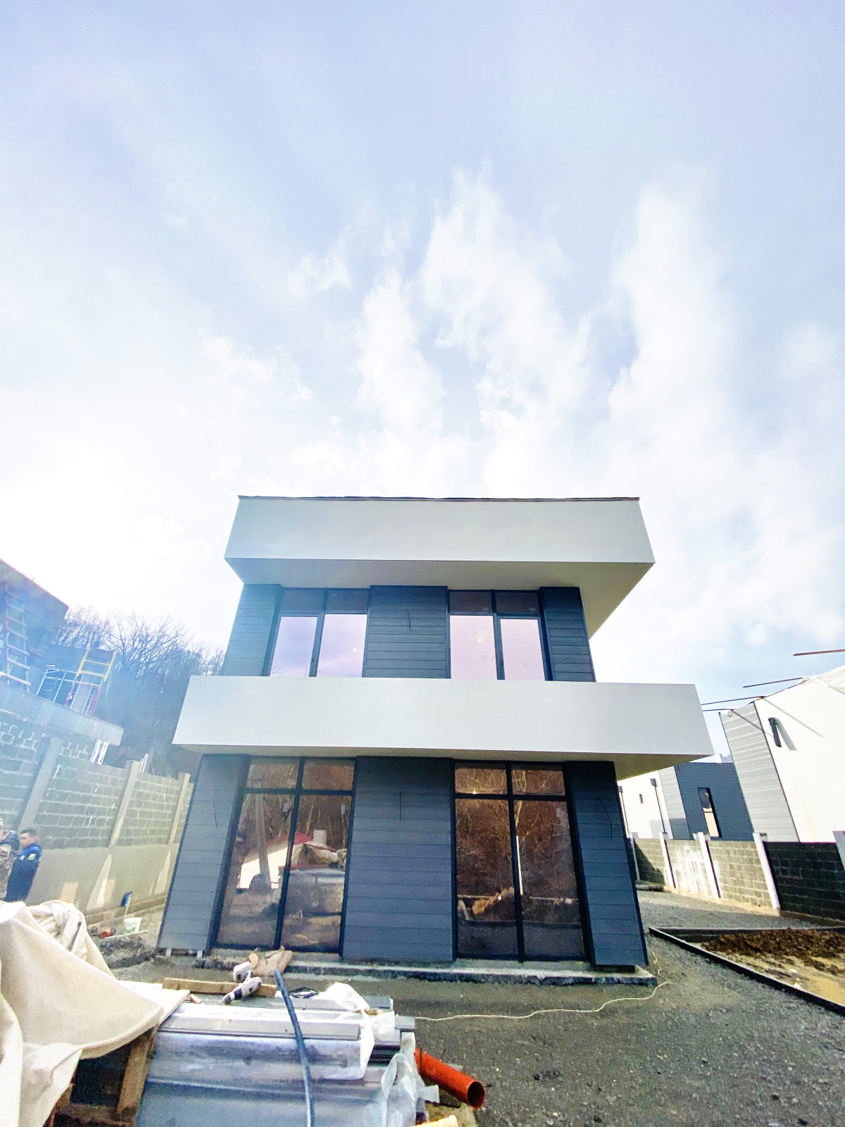 Отделка фасадов коттеджного поселка