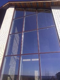 Остекление жилого дома теплыми фасадными алюминиевыми  контструкциями.