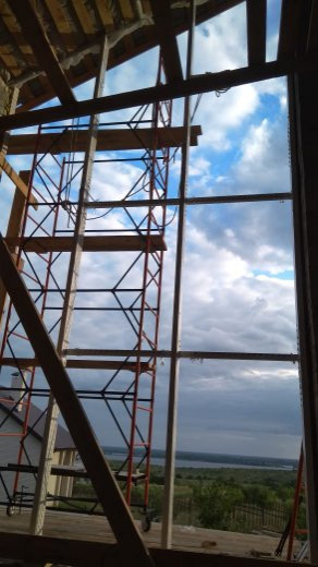 Остекление жилого дома теплыми фасадными алюминиевыми  контструкциями.