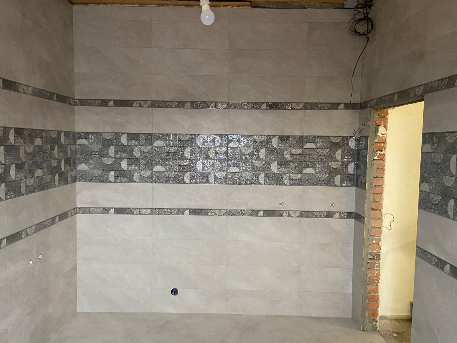 Укладка керамогранита в ваной