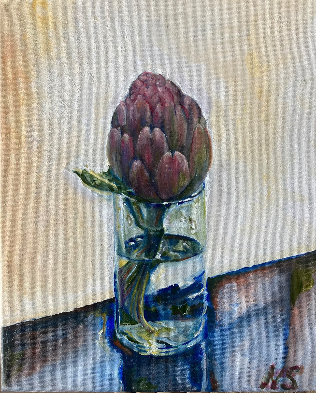 Artichoke in a glass of water