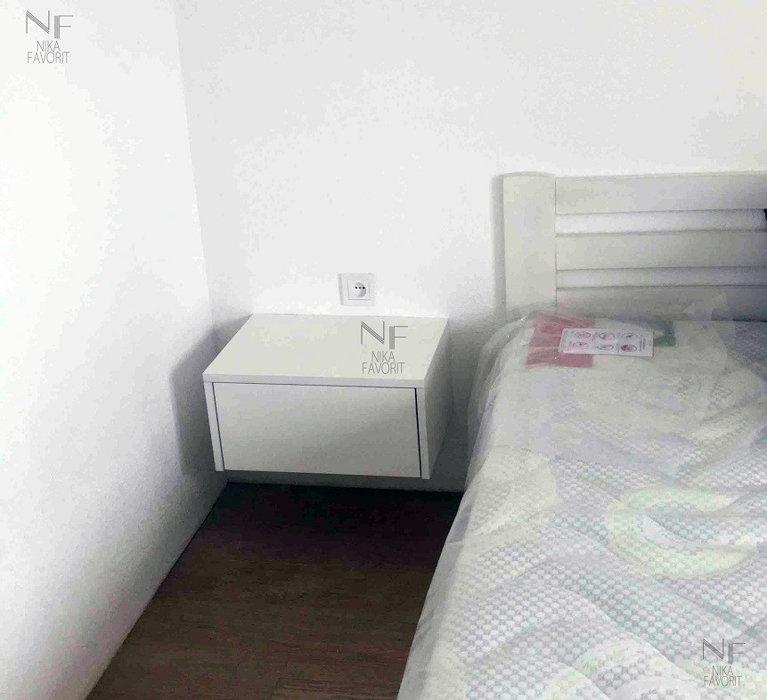 MODERN BEDROOM WITH WOODEN BED