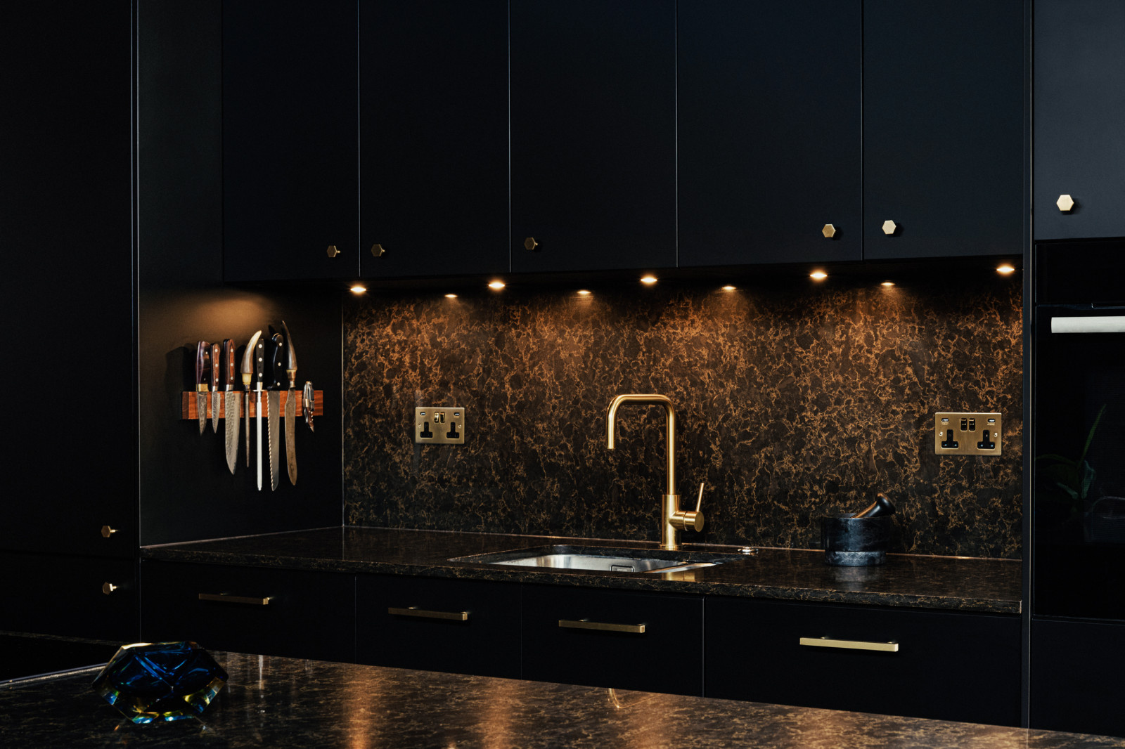 Black kitchen with Brass details
