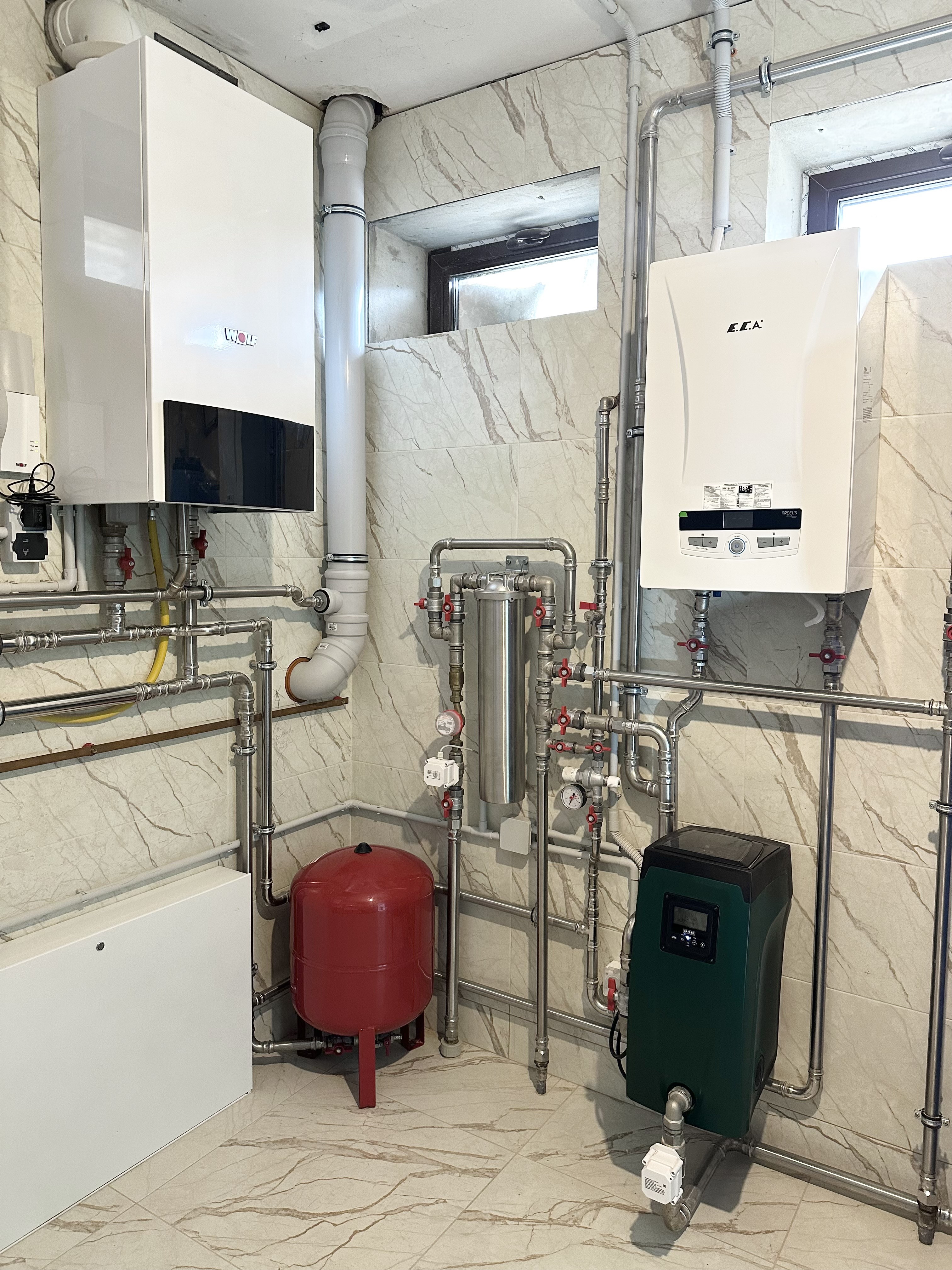 Котельная в доме 400 м2 на базе двух котлов Wolf с погодозависимой автоматизацией