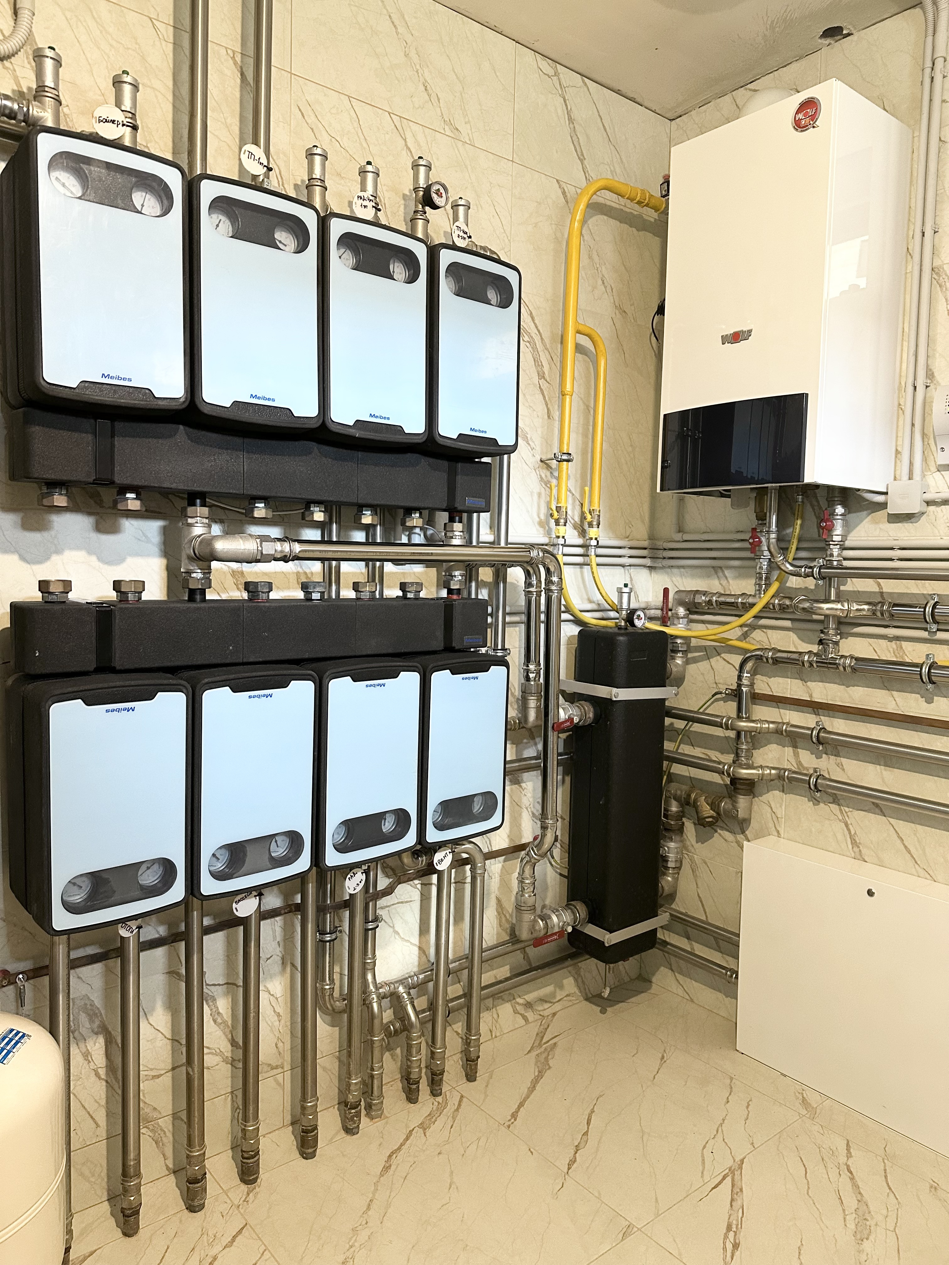 Котельная в доме 400 м2 на базе двух котлов Wolf с погодозависимой автоматизацией