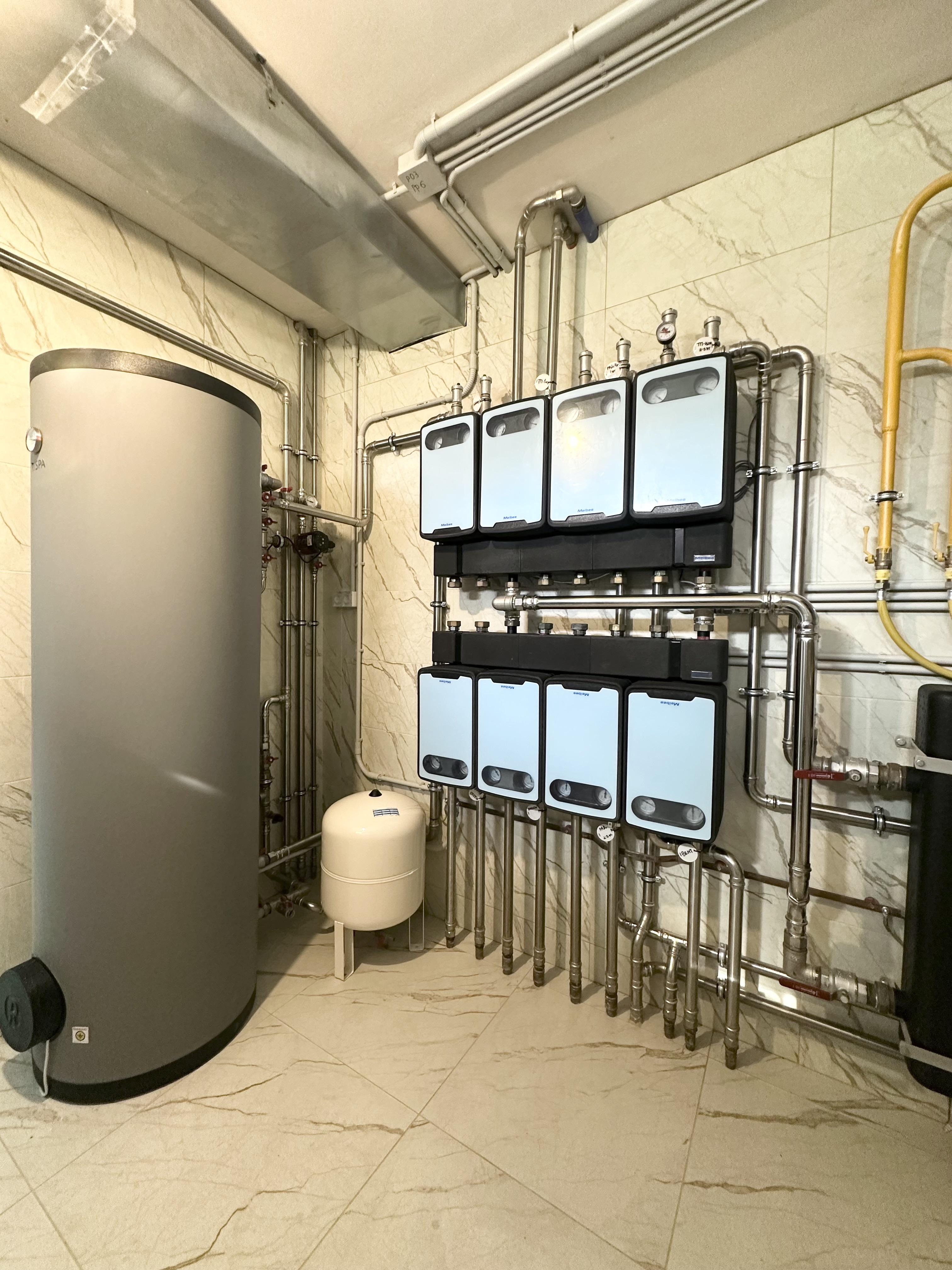 Котельная в доме 400 м2 на базе двух котлов Wolf с погодозависимой автоматизацией