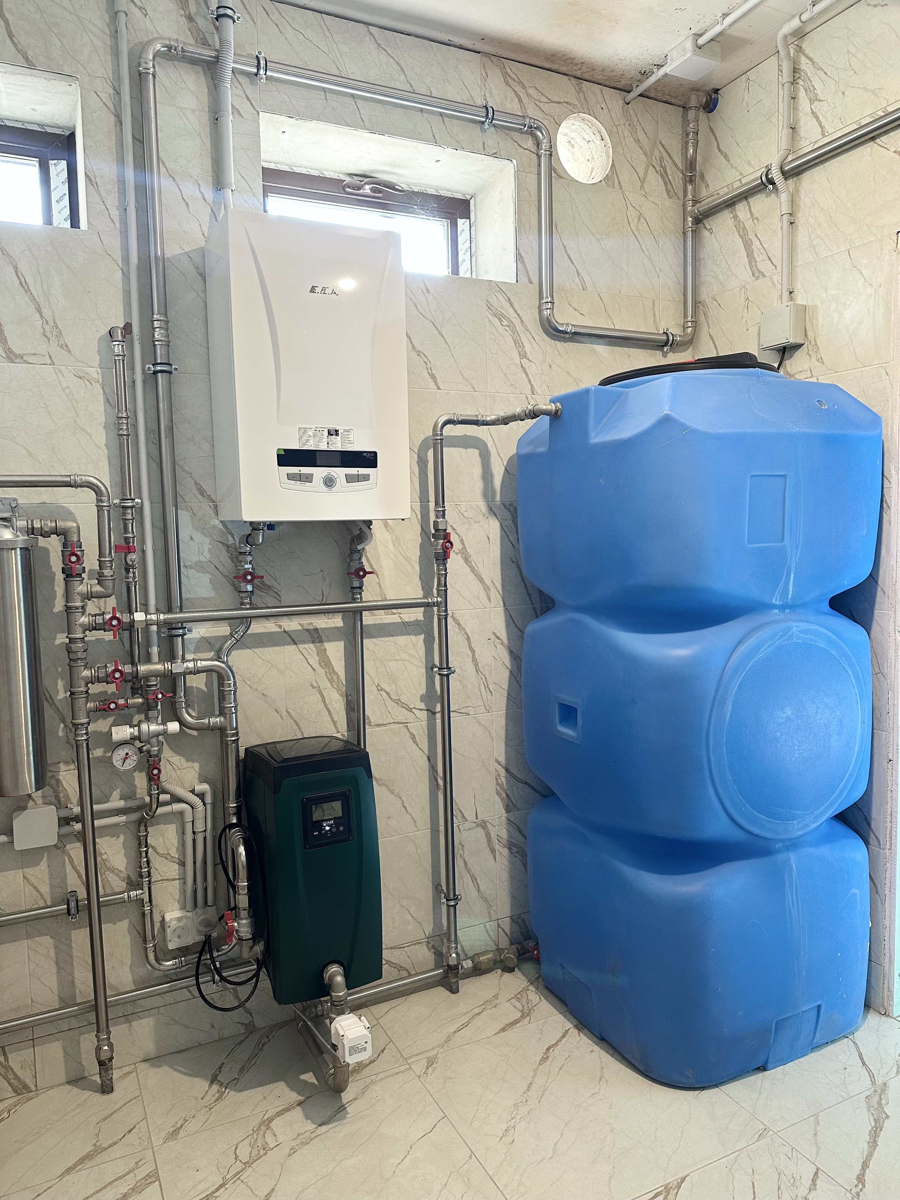 Котельная в доме 400 м2 на базе двух котлов Wolf с погодозависимой автоматизацией