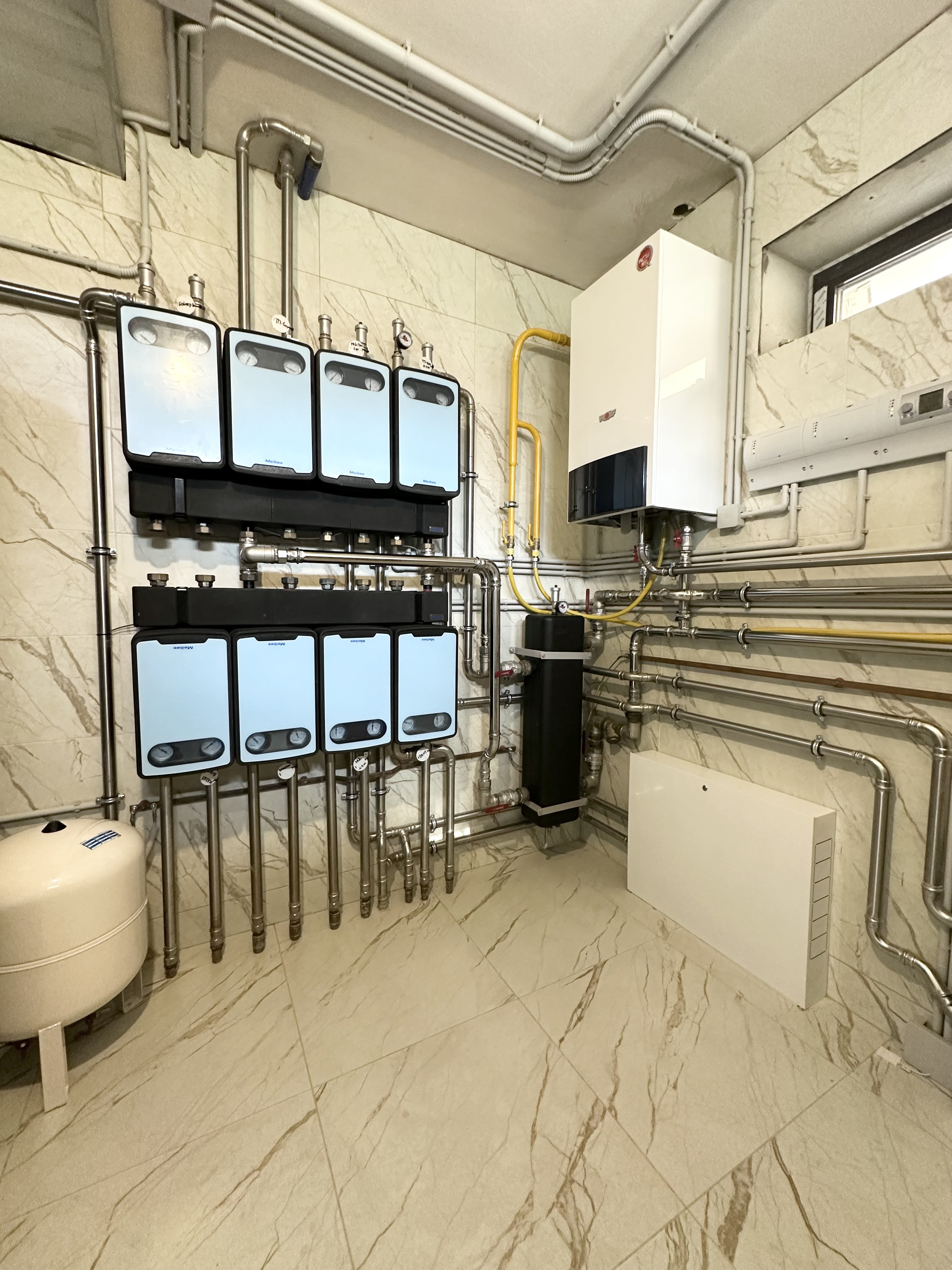 Котельная в доме 400 м2 на базе двух котлов Wolf с погодозависимой автоматизацией