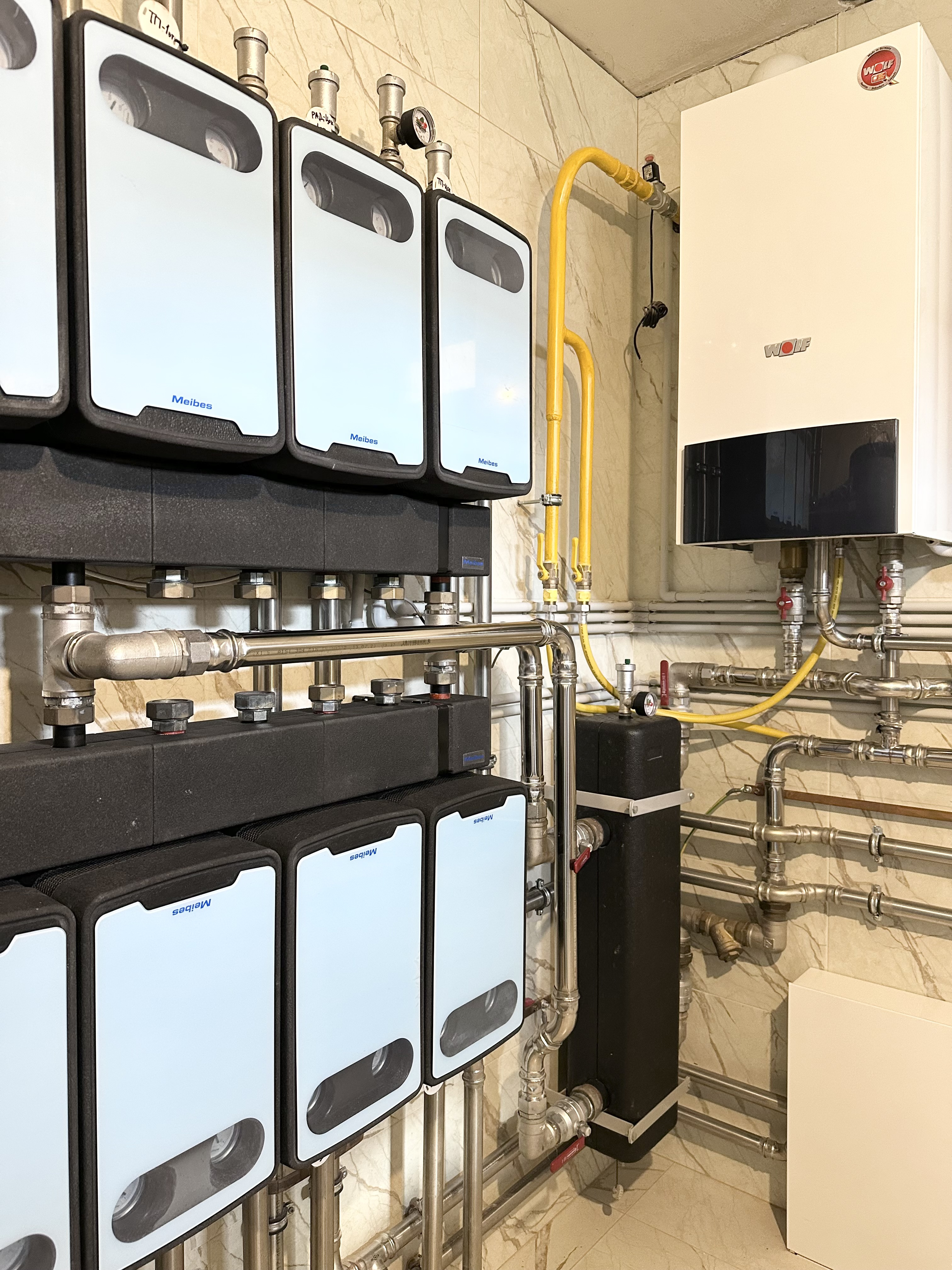 Котельная в доме 400 м2 на базе двух котлов Wolf с погодозависимой автоматизацией