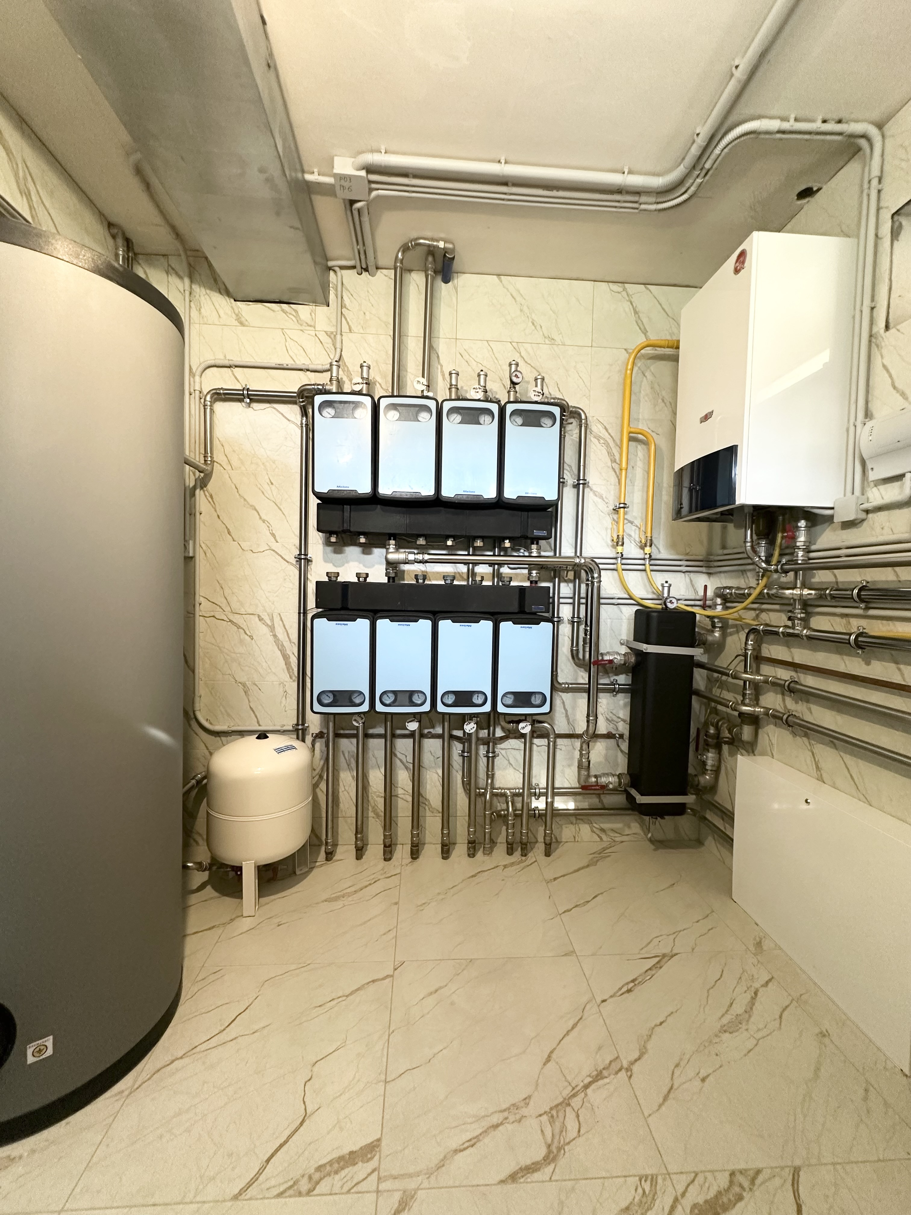 Котельная в доме 400 м2 на базе двух котлов Wolf с погодозависимой автоматизацией