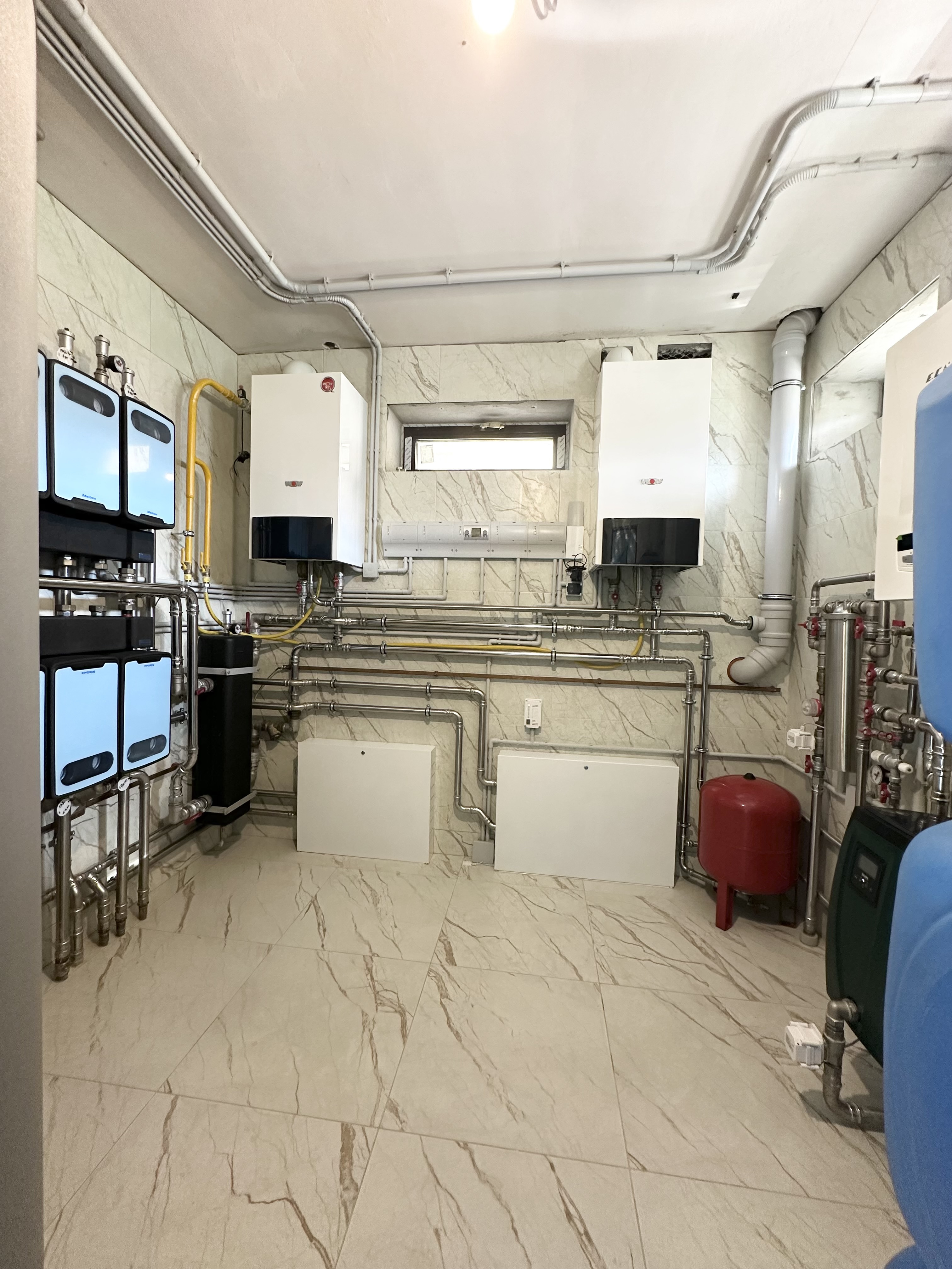 Котельная в доме 400 м2 на базе двух котлов Wolf с погодозависимой автоматизацией