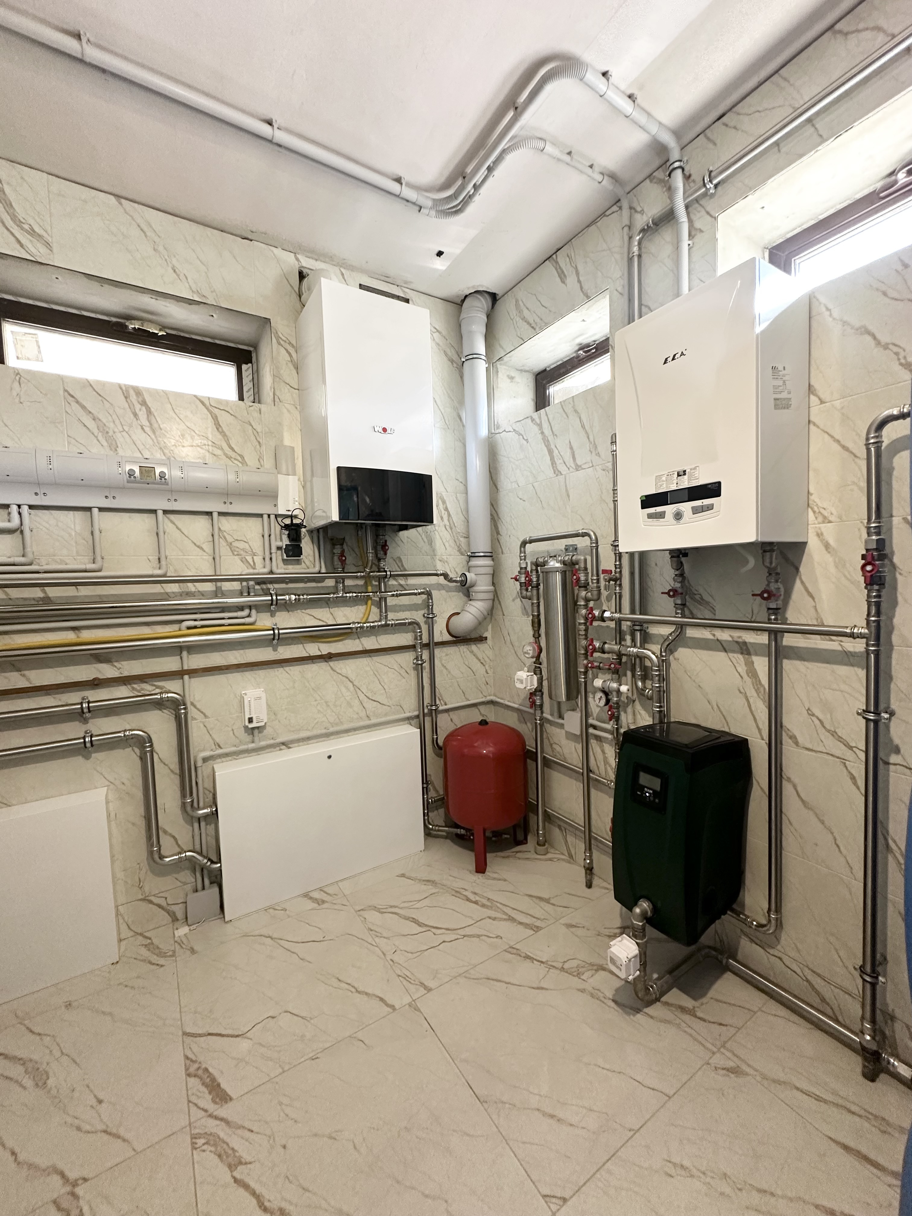 Котельная в доме 400 м2 на базе двух котлов Wolf с погодозависимой автоматизацией